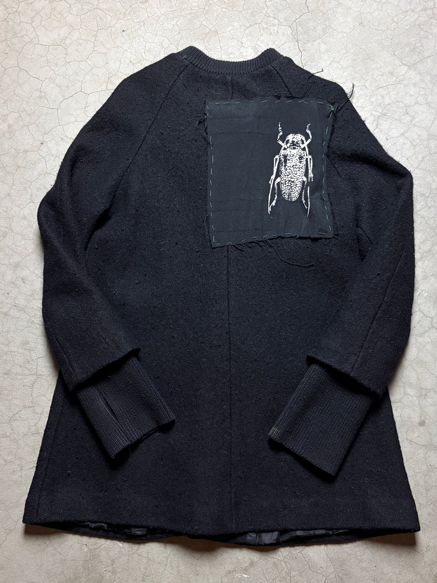 CannIBAL Avant-Garde Wool Coat with Hand-Stitched Beetle Patch